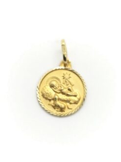 Medalla niño en el pesebre